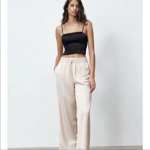 Zara cream colored split hem high waisted pants.    XS